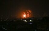 Flames and smoke rise during Israeli airstrikes in the central Gaza strip, on April 21, 2022. (Bashar Taleb/AFP)