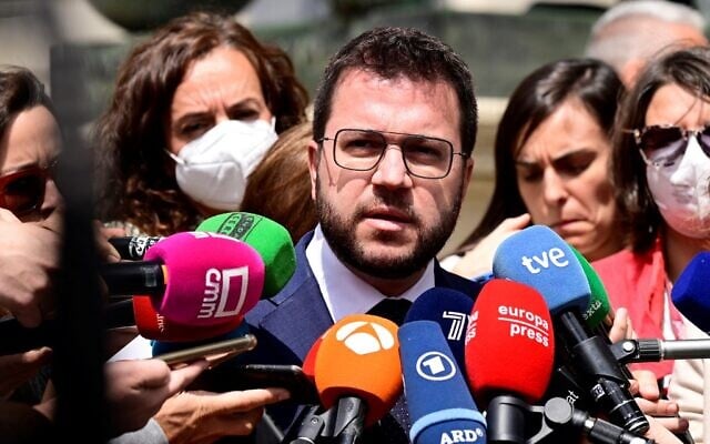 Catalan regional president Pere Aragones talks to the press in front of the Palacio de las Cortes congress in Madrid on April 21, 2022. (Javier Soriano/AFP) Catalan regional president Pere Aragones talks to the press in front of the Palacio de las Cortes congress in Madrid on April 21, 2022. (Javier Soriano/AFP)