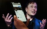 In this photo illustration, a phone screen displays the Twitter account of Elon Musk with a photo of him shown in the background, on April 14, 2022, in Washington, DC. (Olivier Douliery/AFP)