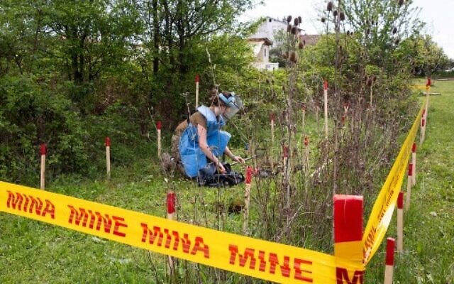 Anastasiia Minchukova attends a demining training near the town of Peja on April 25, 2022. (Photo by AFP) Anastasiia Minchukova attends a demining training near the town of Peja on April 25, 2022. (Photo by AFP)