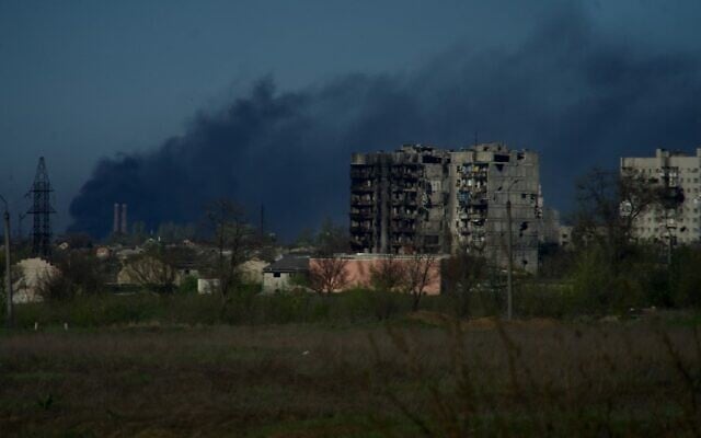 Smoke rises from the grounds of the Azovstal steel plant in the city of Mariupol on April 29, 2022, amid the ongoing Russian invasion of Ukraine. (Andrey Borodulin/AFP) Smoke rises from the grounds of the Azovstal steel plant in the city of Mariupol on April 29, 2022, amid the ongoing Russian invasion of Ukraine. (Andrey Borodulin/AFP)