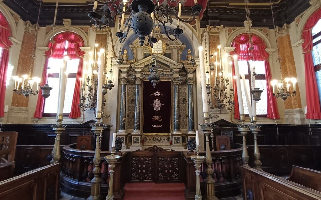The Torah ark sits illuminated by chandeliers in the Scuola Grande Spagnola, or Spanish Synagogue, in Venice. (Orge Castellano/JTA)