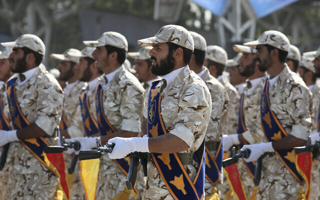 In this September 22, 2011 photo, members of Iran's Revolutionary Guard march in front of the mausoleum of the late Iranian revolutionary founder Ayatollah Khomeini, just outside Tehran, Iran (AP Photo/Vahid Salemi) In this September 22, 2011 photo, members of Iran's Revolutionary Guard march in front of the mausoleum of the late Iranian revolutionary founder Ayatollah Khomeini, just outside Tehran, Iran (AP Photo/Vahid Salemi)