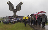 File: Hundreds gather at the memorial center to pay their respects for tens of thousands of people killed in death camps run by Croatia's pro-Nazi puppet state in WWII, in Jasenovac, Croatia, April 12, 2019. (AP Photo/Nikola Solic)
