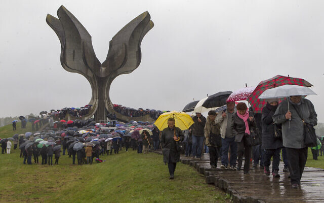 File: Hundreds gather at the memorial center to pay their respects for tens of thousands of people killed in death camps run by Croatia's pro-Nazi puppet state in WWII, in Jasenovac, Croatia, April 12, 2019. (AP Photo/Nikola Solic) File: Hundreds gather at the memorial center to pay their respects for tens of thousands of people killed in death camps run by Croatia's pro-Nazi puppet state in WWII, in Jasenovac, Croatia, April 12, 2019. (AP Photo/Nikola Solic)