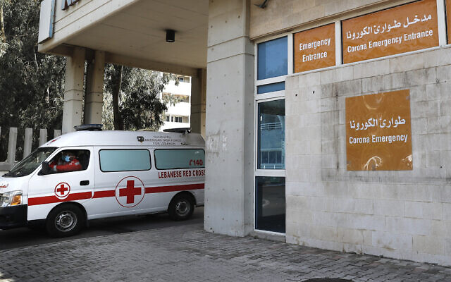 Illustrative: An ambulance of the Lebanese Red Cross in Beirut, Lebanon, March 11, 2020. (Hussein Malla/AP) Illustrative: An ambulance of the Lebanese Red Cross in Beirut, Lebanon, March 11, 2020. (Hussein Malla/AP)