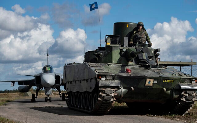 In this photo provided by the Swedish Armed Forces on Tuesday, August 25, 2020, troops prepare in the Baltic Sea region. (Joel Thungren/Swedish Armed Forces/TT via AP) In this photo provided by the Swedish Armed Forces on Tuesday, August 25, 2020, troops prepare in the Baltic Sea region. (Joel Thungren/Swedish Armed Forces/TT via AP)