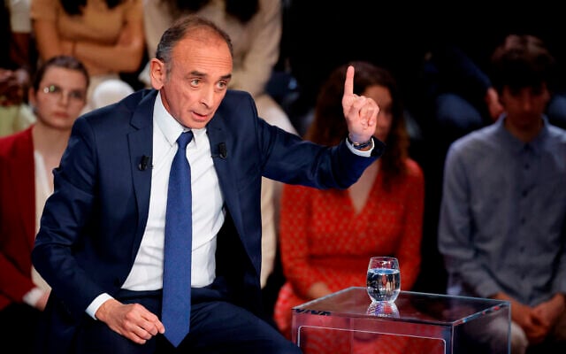 France's far-right candidate for the 2022 presidential election Eric Zemmour speaks during the show "France in the Face of War," in Saint-Denis, north of Paris, March 14, 2022. (Ludovic Marin, Pool via AP) France's far-right candidate for the 2022 presidential election Eric Zemmour speaks during the show "France in the Face of War," in Saint-Denis, north of Paris, March 14, 2022. (Ludovic Marin, Pool via AP)