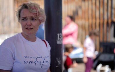 Illustrative: A Russian woman seeking asylum in the United States recalls her trip from Russia to the Mexican border, standing near the San Ysidro Port of Entry into the United States, in Tijuana, Mexico, on March 17, 2022. (AP Photo/Gregory Bull) Illustrative: A Russian woman seeking asylum in the United States recalls her trip from Russia to the Mexican border, standing near the San Ysidro Port of Entry into the United States, in Tijuana, Mexico, on March 17, 2022. (AP Photo/Gregory Bull)