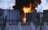 Smoke and fire is seen after shelling in Odesa, Ukraine, on April 3, 2022. (AP Photo/Max Pshybyshevsky)