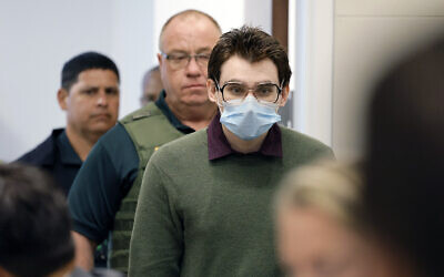 Marjory Stoneman Douglas High School shooter Nikolas Cruz enters the courtroom before jury pre-selection in the penalty phase of his trial at the Broward County Courthouse in Fort Lauderdale, Florida, April 4, 2022 (Amy Beth Bennett/South Florida Sun Sentinel via AP, Pool)