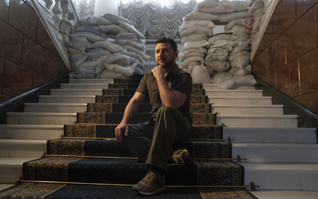 Ukrainian President Volodymyr Zelenskyy speaks with The Associated Press in his office in Kyiv, Ukraine, Saturday, April 9, 2022. Zelensky says he's committed to pressing for peace despite Russian attacks on civilians that have stunned the world. (AP/Evgeniy Maloletka)