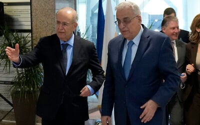 Cyprus' foreign minister Ioannis Kasoulides, left, welcomes his Lebanese counterpart Abdallah Bou Habib following their meeting at the foreign ministry house in Nicosia, Cyprus, Friday, April 15, 2022. (AP Photo/Petros Karadjias) Cyprus' foreign minister Ioannis Kasoulides, left, welcomes his Lebanese counterpart Abdallah Bou Habib following their meeting at the foreign ministry house in Nicosia, Cyprus, Friday, April 15, 2022. (AP Photo/Petros Karadjias)