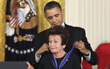 Then US President Barack Obama presents Jewish Holocaust survivor Gerda Weissmann Klein, a 2010 Presidential Medal of Freedom on February 15, 2011, during a ceremony in the East Room of the White House in Washington, DC. (AP Photo/Carolyn Kaster, File)