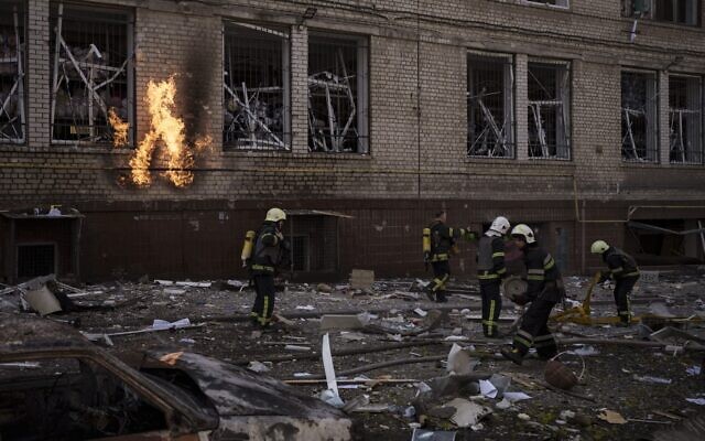 Firefighters work to extinguish multiple fires after a Russian attack in Kharkiv, Ukraine, on April 16, 2022. (AP Photo/Felipe Dana) Firefighters work to extinguish multiple fires after a Russian attack in Kharkiv, Ukraine, on April 16, 2022. (AP Photo/Felipe Dana)