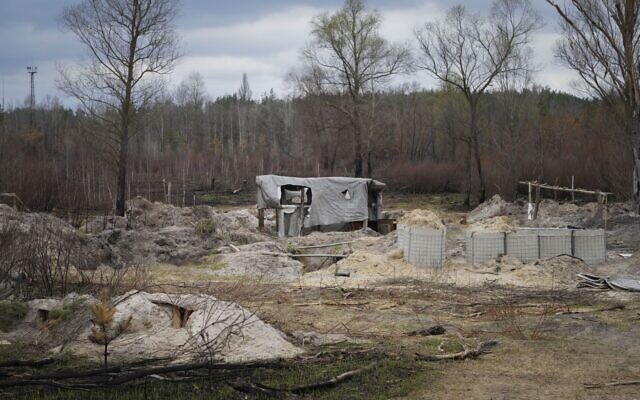 Russian trenches and firing positions in the highly radioactive Red Forest stuffed with radioactive remnants near the Chernobyl nuclear power plant in Chernobyl, Ukraine, on April 16, 2022. (AP Photo/Efrem Lukatsky)