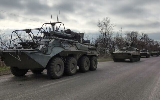 A Russian military convoy moves on a highway in an area controlled by Russian-backed separatist forces near Mariupol, Ukraine, April 16, 2022. (AP Photo/Alexei Alexandrov)
