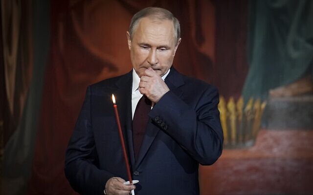 Russian President Vladimir Putin attends the Orthodox Easter service in the Christ the Savior Cathedral in Moscow, Russia, April 24, 2022. (Alexander Zemlianichenko/ AP) Russian President Vladimir Putin attends the Orthodox Easter service in the Christ the Savior Cathedral in Moscow, Russia, April 24, 2022. (Alexander Zemlianichenko/ AP)