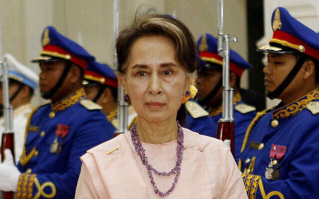 Suu Kyi reviews an honor guard at the Peace Palace in Phnom Penh, Cambodia on April 30, 2019. (Heng Sinith/AP) Suu Kyi reviews an honor guard at the Peace Palace in Phnom Penh, Cambodia on April 30, 2019. (Heng Sinith/AP)