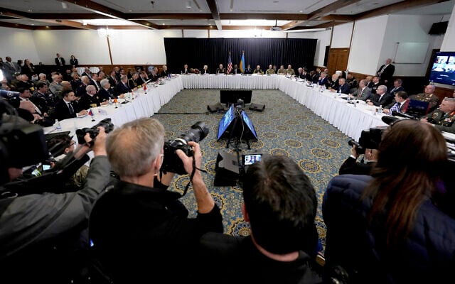 US Secretary of Defense, Lloyd Austin, rear center, delivers a speech as he hosts the meeting of the Ukraine Security Consultative Group at Ramstein Air Base in Ramstein, Germany, on April 26, 2022. (AP Photo/Michael Probst) US Secretary of Defense, Lloyd Austin, rear center, delivers a speech as he hosts the meeting of the Ukraine Security Consultative Group at Ramstein Air Base in Ramstein, Germany, on April 26, 2022. (AP Photo/Michael Probst)