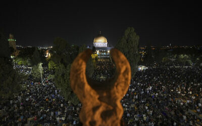 Palestinian Muslim worshipers pray on Laylat al-Qadr, Night of Destiny, in the Al-Aqsa Mosque on the Temple Mount in Jerusalem during the Muslim holy month of Ramadan on April 27, 2022. (AP Photo/Mahmoud Illean)
