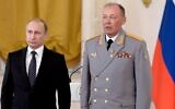In this pool photo taken on Thursday, March  17, 2016, Russian President Vladimir Putin, left, poses with Col. Gen. Alexander Dvornikov during an awarding ceremony in Moscow's Kremlin, Russia. (Alexei Nikolsky/Sputnik, Kremlin Pool Photo via AP)