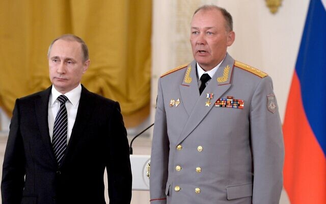 In this pool photo taken on Thursday, March 17, 2016, Russian President Vladimir Putin, left, poses with Col. Gen. Alexander Dvornikov during an awarding ceremony in Moscow's Kremlin, Russia. (Alexei Nikolsky/Sputnik, Kremlin Pool Photo via AP) In this pool photo taken on Thursday, March 17, 2016, Russian President Vladimir Putin, left, poses with Col. Gen. Alexander Dvornikov during an awarding ceremony in Moscow's Kremlin, Russia. (Alexei Nikolsky/Sputnik, Kremlin Pool Photo via AP)