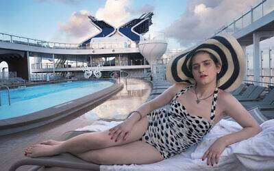 Abby Chava Stein, an American transgender activist, relaxes on the Resort Deck of Celebrity Apex. (Photographed by Annie Leibovitz for Celebrity Cruises' All Inclusive Photo Project/via JTA)