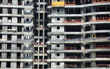 Illustrative. The construction site of a new residential building in the coastal city of Netanya, on March 26, 2020. (Gili Yaari/Flash90)