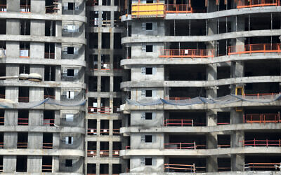 Illustrative. The construction site of a new residential building in the coastal city of Netanya, on March 26, 2020. (Gili Yaari/Flash90)