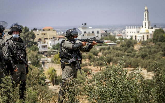 Illustrative: Israeli security forces clash with Palestinians during a protest north of Tulkarm, August 20, 2020. (Nasser Ishtayeh/Flash90) Illustrative: Israeli security forces clash with Palestinians during a protest north of Tulkarm, August 20, 2020. (Nasser Ishtayeh/Flash90)