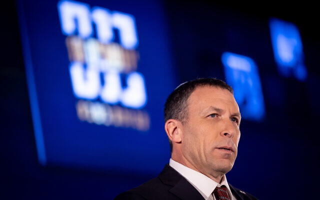Religious Affairs Minister Matan Kahana speaks during a conference in Jerusalem on February 7, 2022. (Yonatan Sindel/Flash90) Religious Affairs Minister Matan Kahana speaks during a conference in Jerusalem on February 7, 2022. (Yonatan Sindel/Flash90)