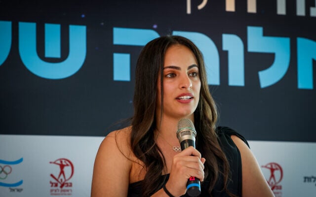 Olympic gold medalist Linoy Ashram speaks during a press conference on April 4, 2022 in Tel Aviv announcing her retirement from competition. (Roy Alima/Flash90) Olympic gold medalist Linoy Ashram speaks during a press conference on April 4, 2022 in Tel Aviv announcing her retirement from competition. (Roy Alima/Flash90)
