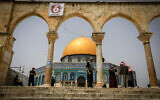 Palestinians seen on the holy month of Ramadan at the Al-Aqsa Mosque compound atop the Temple Mount in Jerusalem's Old City, on April 17, 2022. (Jamal Awad/Flash90)