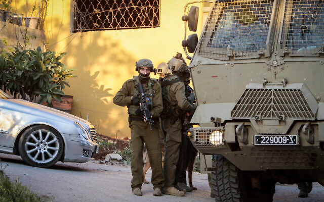 Israeli soldiers seen during a raid in the village of Salem, east of the city of Nablus, in the West Bank, on April 20, 2022. (Nasser Ishtayeh/Flash90) Israeli soldiers seen during a raid in the village of Salem, east of the city of Nablus, in the West Bank, on April 20, 2022. (Nasser Ishtayeh/Flash90)