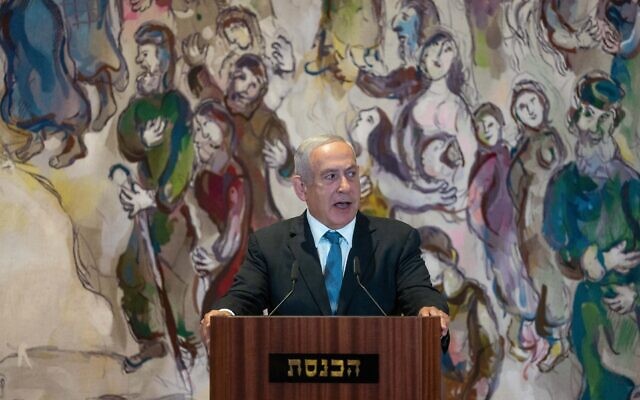 Opposition leader Benjamin Netanyahu speaks during a Holocaust Remembrance Day ceremony at the Knesset in Jerusalem, on April 28, 2022. (Yonatan Sindel/Flash90) Opposition leader Benjamin Netanyahu speaks during a Holocaust Remembrance Day ceremony at the Knesset in Jerusalem, on April 28, 2022. (Yonatan Sindel/Flash90)