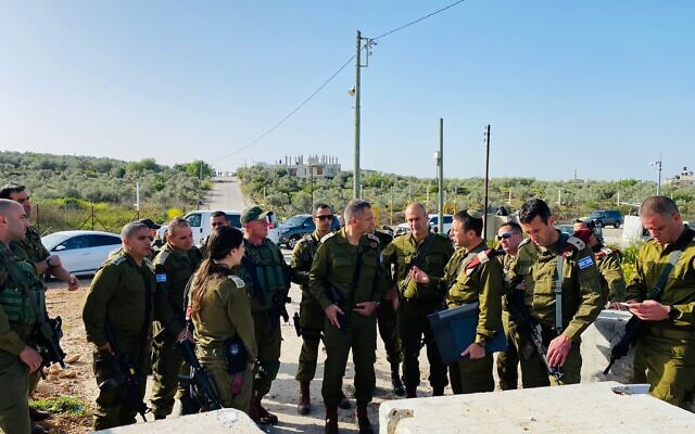 Military chief Aviv Kohavi tours the West Bank security barrier, April 1, 2022. (Israel Defense Forces) Military chief Aviv Kohavi tours the West Bank security barrier, April 1, 2022. (Israel Defense Forces)