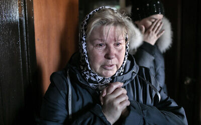 Olga (65) and her daughter Svetlana cry after watching a Russian missile destroy their apartment in Podill district, Kyiv, Ukraine, March 18, 2022.

(Photo credit: AG)

Image may be used in any HIAS materials, print and digital, until March 24, 2023. After this date, additional usage must be re-negotiated directly with photographer. No affiliate rights granted.