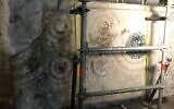The stone slab, once a Crusader-era altar, in Jerusalem’s Holy Sepulchre Church, April 11, 2022. (Amanda Borschel-Dan/TOI)