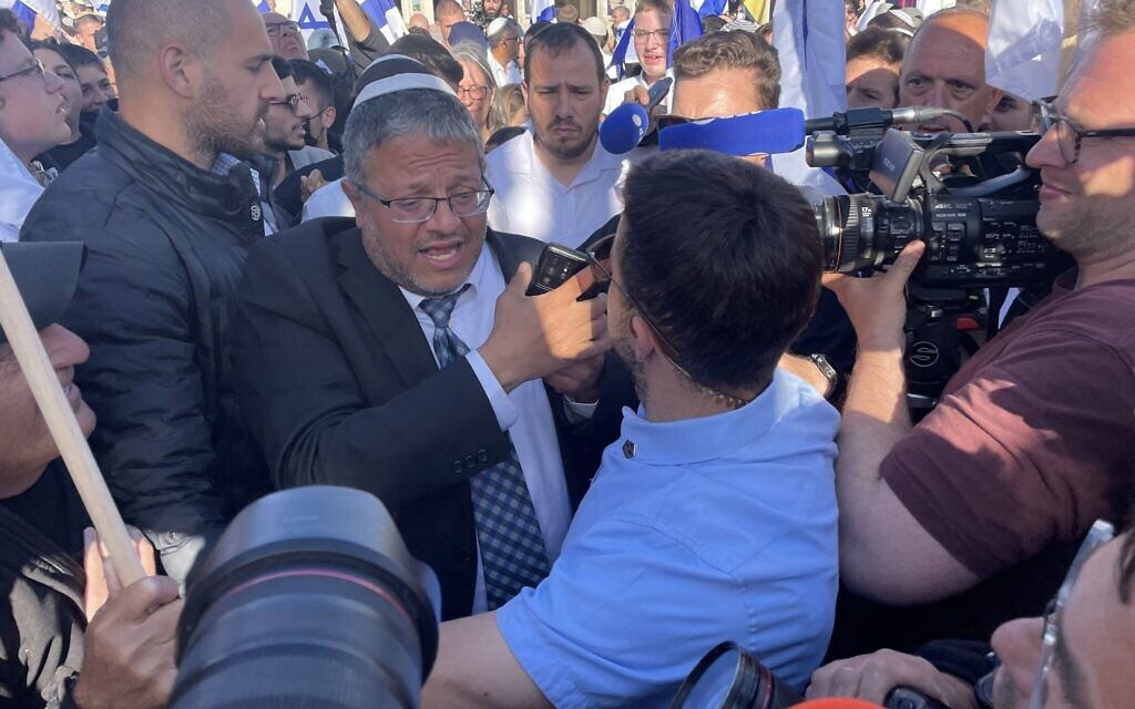 Itamar Ben Gvir speaks to the media at Safra Square in Jerusalem ahead of a right-wing march on April 20, 2022. (Carrie Keller-Lynn/Times of Israel)
