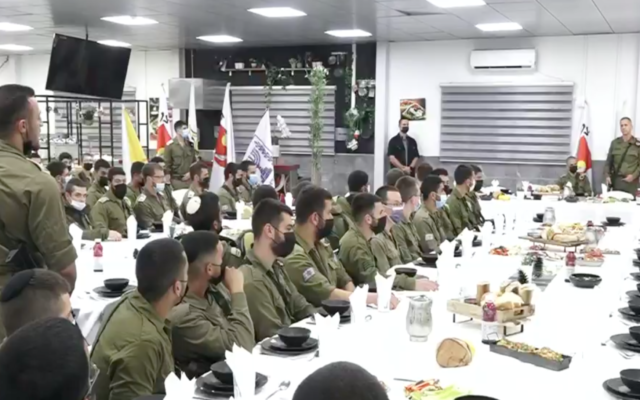 IDF Chief of Staff Aviv Kohavi (right) listens as a soldier addresses him at the Ofer military base in the West Bank on April 7, 2022. (Screen capture/ Channel 12) IDF Chief of Staff Aviv Kohavi (right) listens as a soldier addresses him at the Ofer military base in the West Bank on April 7, 2022. (Screen capture/ Channel 12)