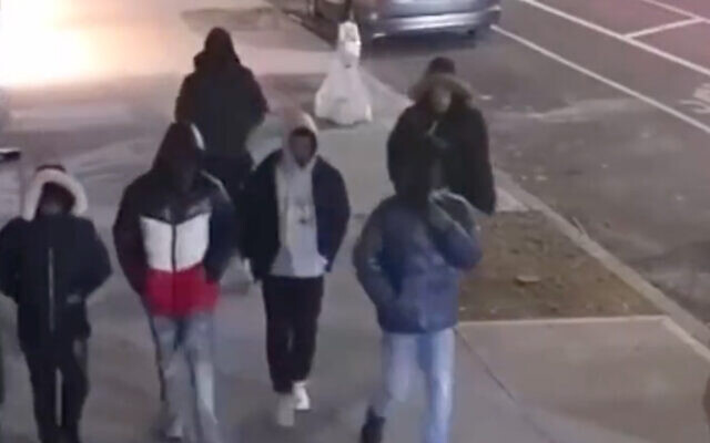 A group that allegedly assaulted a Jewish man in New York City on April 1, 2022, in footage released by the New York Police Department. (Screenshot) A group that allegedly assaulted a Jewish man in New York City on April 1, 2022, in footage released by the New York Police Department. (Screenshot)