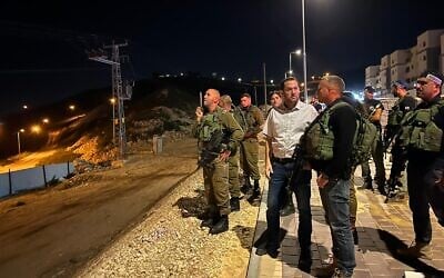 Samaria Regional Council head Yossi Dagan, alongside military and local security forces in the settlement of Avnei Hefetz in the northern West Bank, April 5, 2022. (Samaria Regional Council )