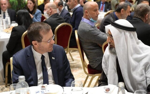 President Isaac Herzog (L) speaks with a religious leader at an Iftar dinner hosted at Herzog's official residence, April 13, 2022. (The President's Office) President Isaac Herzog (L) speaks with a religious leader at an Iftar dinner hosted at Herzog's official residence, April 13, 2022. (The President's Office)