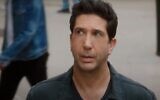 David Schwimmer in an ad for investmant firm Meitav, April 2022. (screenshot)