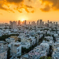 The sun rises over Tel Aviv, October 2019. (ZZ3701 via iStock by Getty Images)