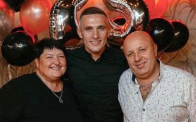 Motyzhyn Mayor Olga Sukhenko (left), her son Alexander and her husband Igor. (screenshot)
