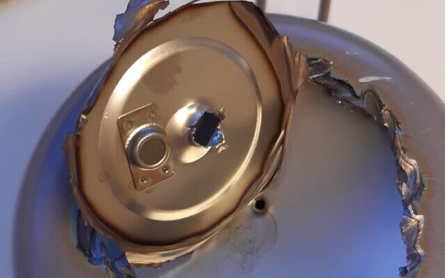 An alleged bug found in a travel mug given as a gift by the Chinese embassy to an Israeli ministry. The mug and others like it proved not to contain anything untoward, the Shin Bet security agency said after investigation, on April 12, 2022. (Courtesy) An alleged bug found in a travel mug given as a gift by the Chinese embassy to an Israeli ministry. The mug and others like it proved not to contain anything untoward, the Shin Bet security agency said after investigation, on April 12, 2022. (Courtesy)