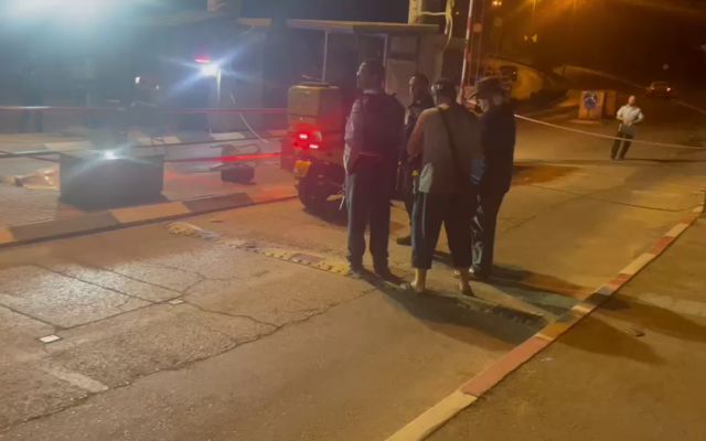 Police and medics are seen at the entrance of Ariel after a shooting, on April 29, 2022. (Magen David Adom)