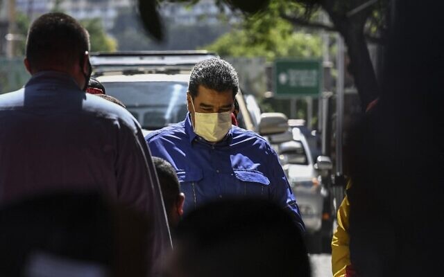 Venezuelan President Nicolas Maduro arrives to deliver a speech to workers taking part in the rally to commemorate May Day in Caracas, on May 1, 2022. (Yuri CORTEZ / AFP) Venezuelan President Nicolas Maduro arrives to deliver a speech to workers taking part in the rally to commemorate May Day in Caracas, on May 1, 2022. (Yuri CORTEZ / AFP)